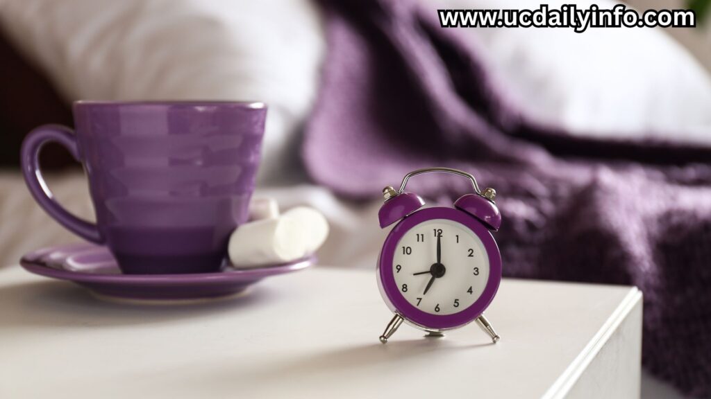 Bedroom with soft morning light, alarm clock, and coffee cup