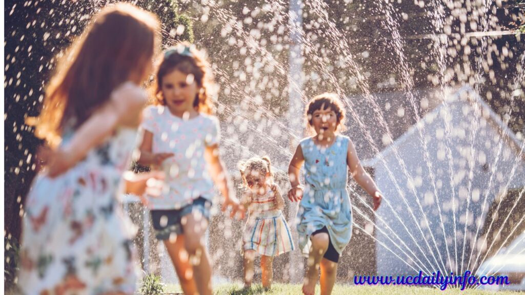 Visual idea: Kids running through sprinklers and playing with water balloons in a sunny backyard. Easy Birthday Party Ideas for Kids