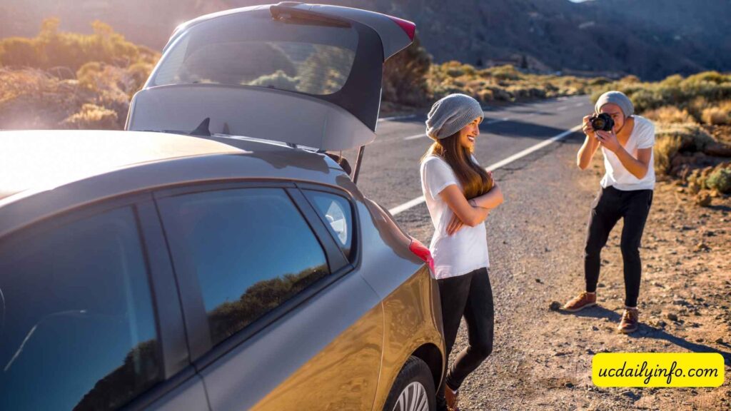Couple-enjoying-a-scenic-road-trip-through-the-mountains
