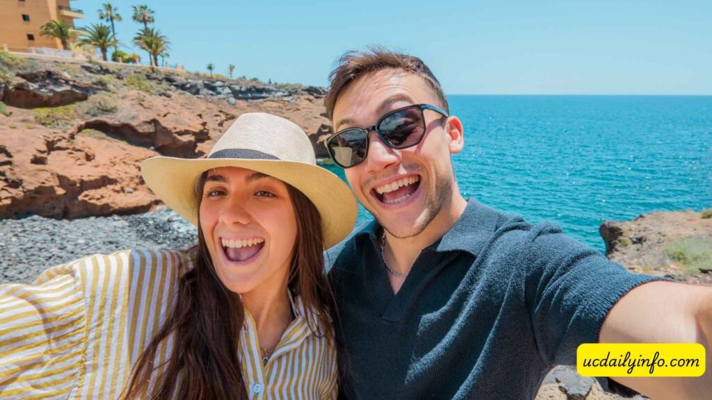Couple-taking-a-selfie-during-a-tropical-beach-vacation