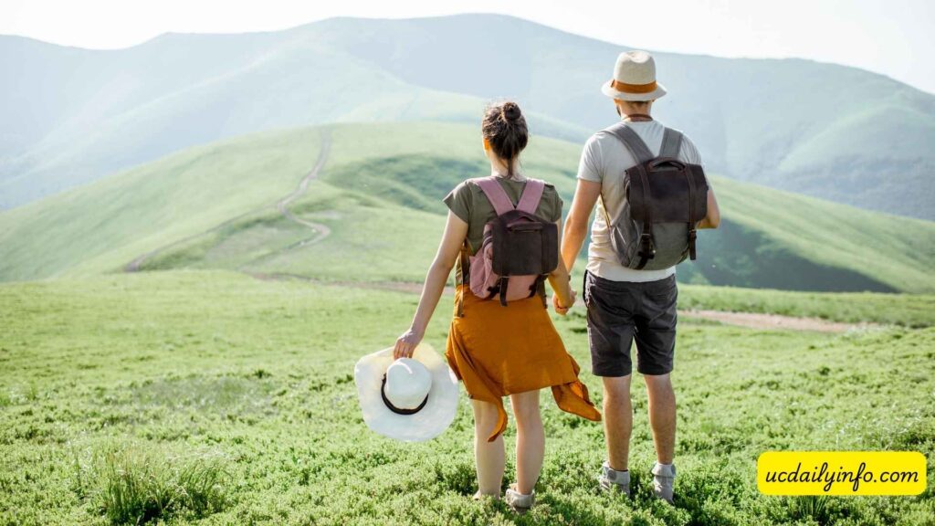 Couple-looking-at-a-mountain-view-from-a-scenic-overlook