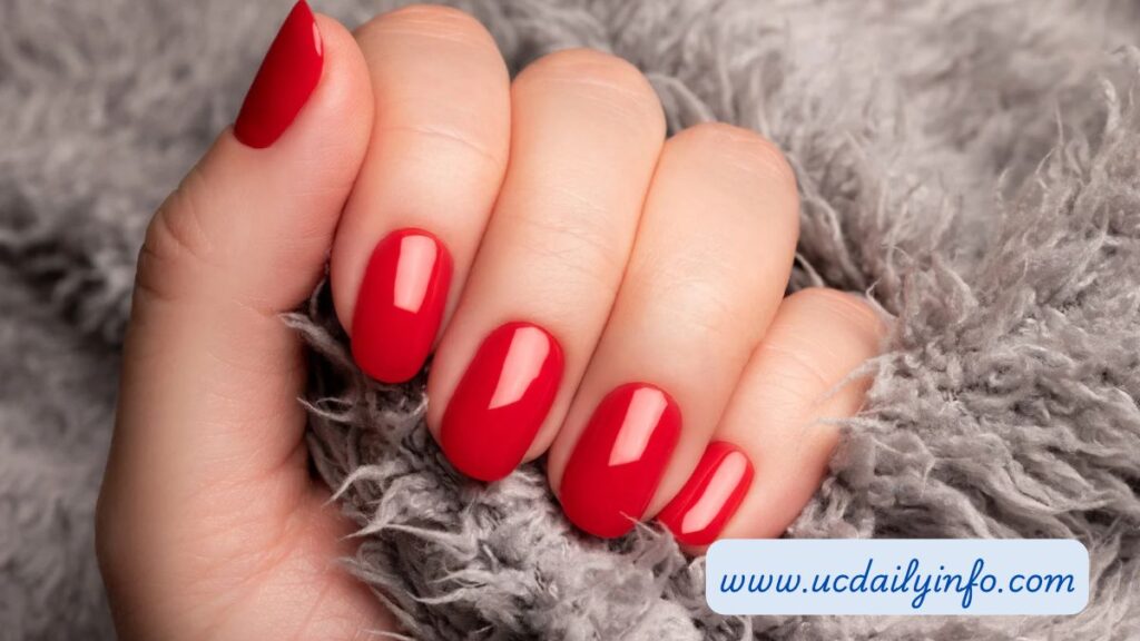 Cherry red trendy nail ideas on short rounded nails