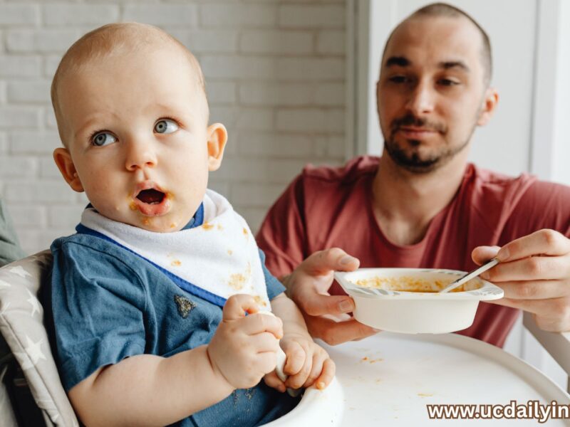 Visual idea: Parent and baby smiling after a successful feeding session, how-to-start-solid-foods-the-easy-way